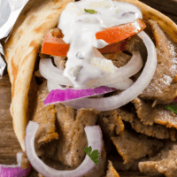 6" gyro lamb and beef gyro topped with onion and tomato